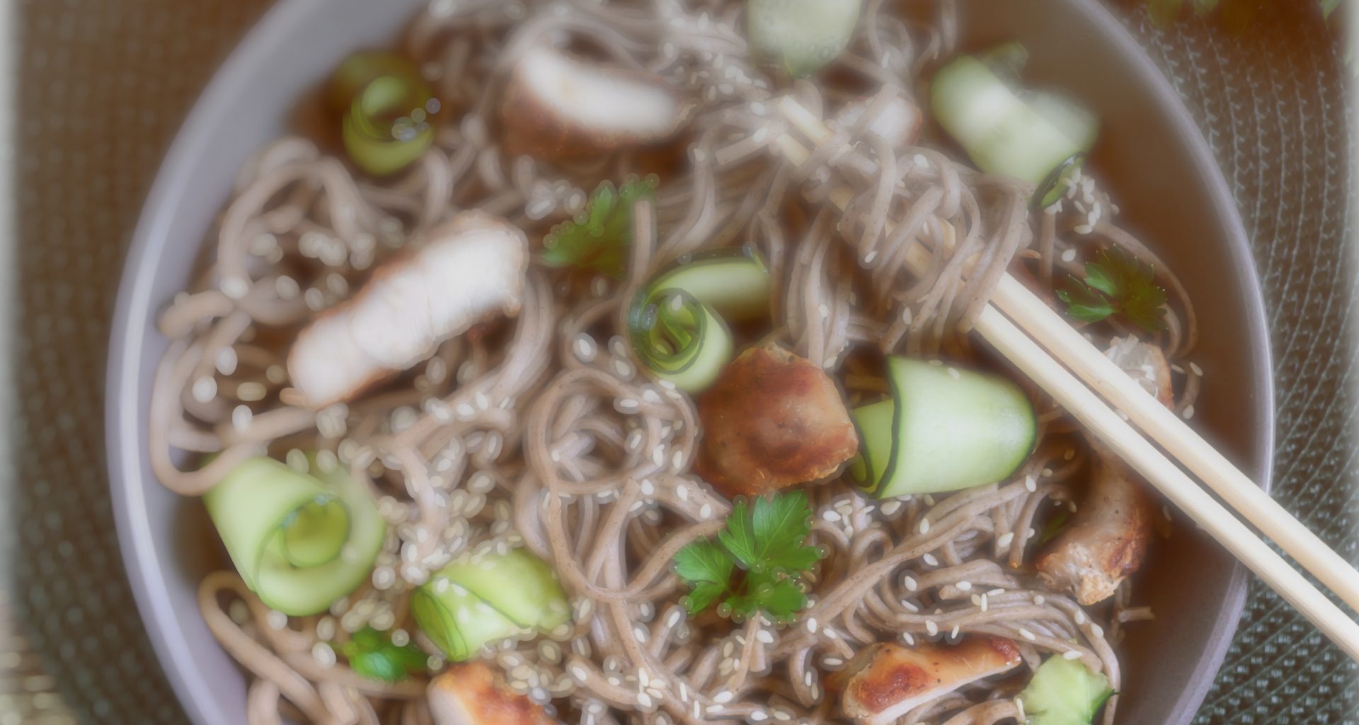 Cold soba with chicken, fresh cucumbers, sauce and sesame. Classic cold salad with buckwheat noodles. Japanese food. Traditional asian cuisine. Top view, flat lay. - https://depositphotos.com/free-files/noodles.html?qview=274519324